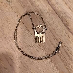 Gold Giraffe Pendant Necklace And Earrings